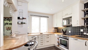  The depth of the upper cabinets in the kitchen