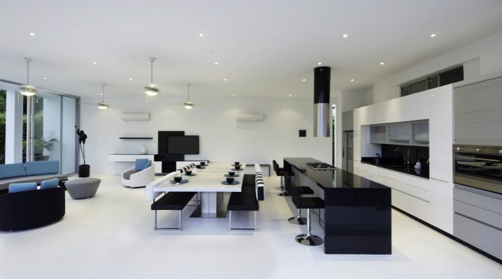  The interiors of the kitchen-living room in a modern style.