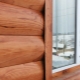  Features metal siding under the log